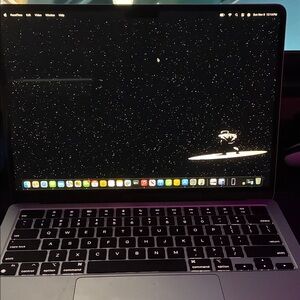 Apple MacBook with Black and Silver Design